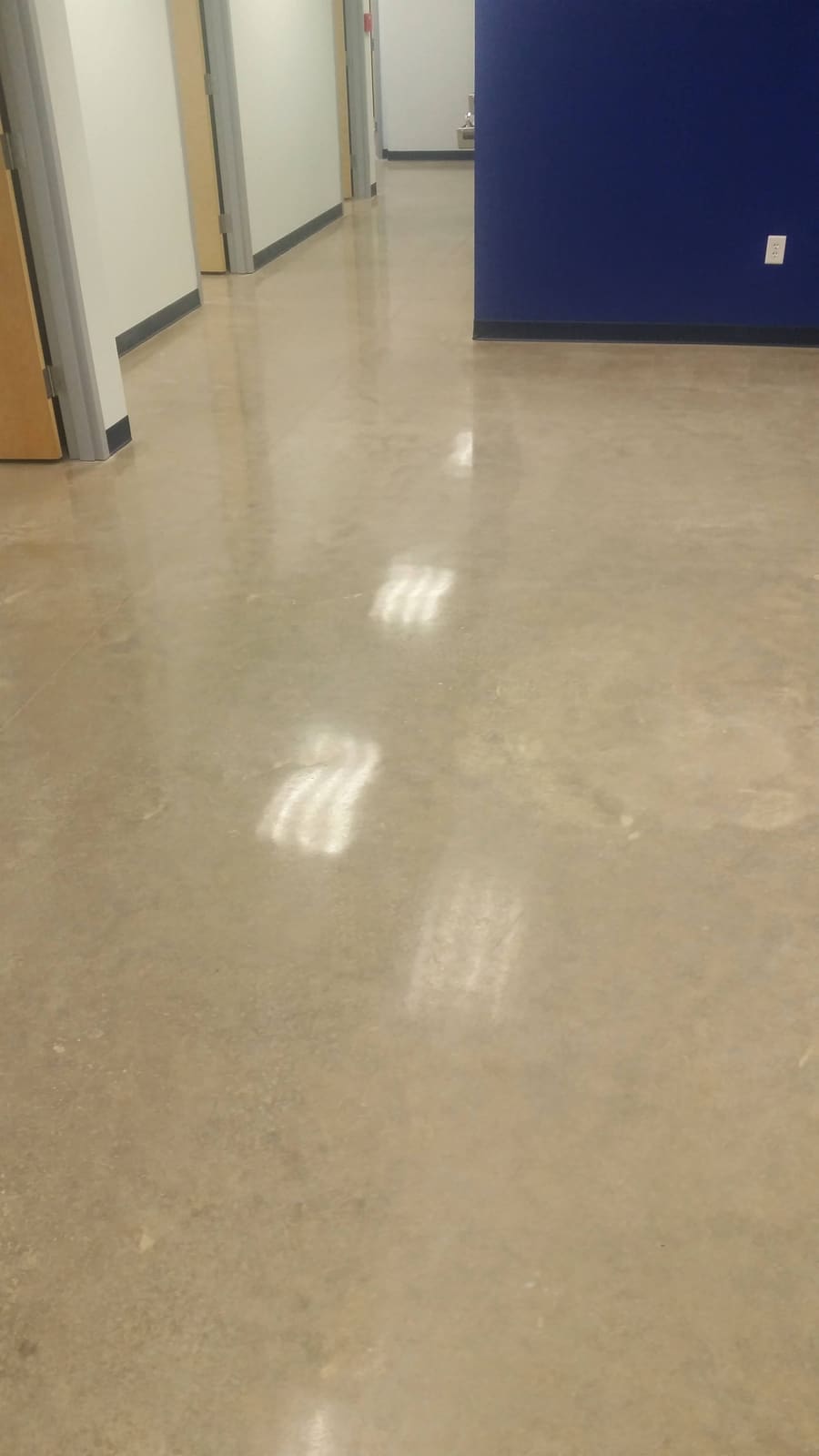 Polished concrete office corridor