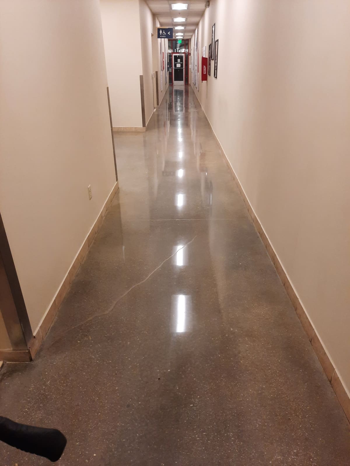 Polished concrete corridor with warm tones